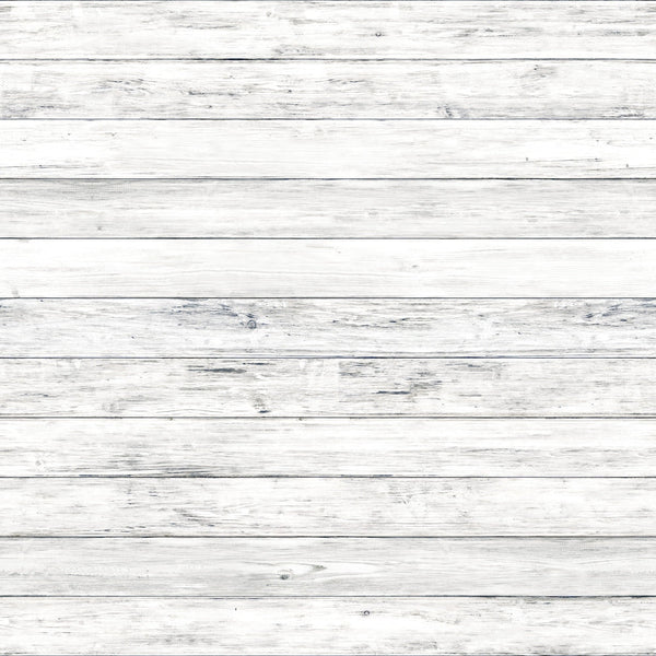 White wooden plank wall with a weathered texture and horizontal alignment.