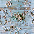 Weathered Filigree Pattern 20 fleece fabric with blush, cream, and sage floral scrollwork on weathered pale-blue wood texture