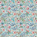 Pattern of dolphins, seashells, flowers, and sea plants on a light blue background.