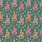 Pattern of pink and orange snakes with flowers and stars on a green background.