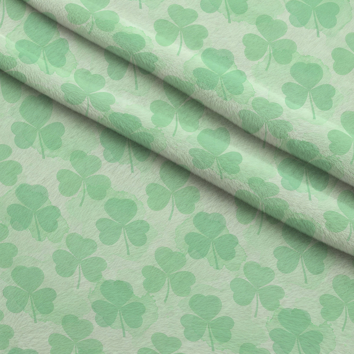 Alcohol Ink Shamrock Pattern 10 Fleece Fabric — fleece fabric folded close-up preview (mv-fleece-v1:lying)