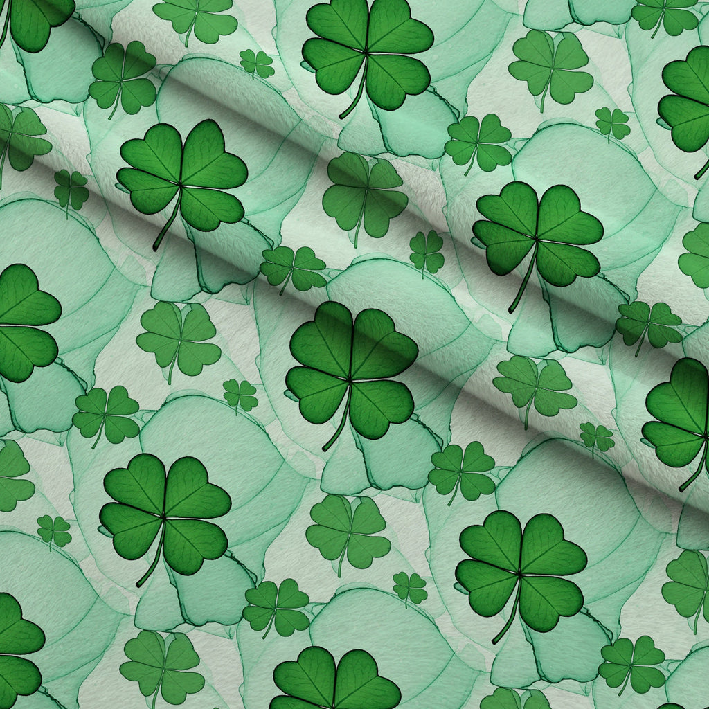 Alcohol Ink Shamrock Pattern 22 Fleece Fabric — fleece fabric folded close-up preview (mv-fleece-v1:lying)
