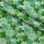 Alcohol Ink Shamrock Pattern 23 Fleece Fabric — fleece fabric folded close-up preview (mv-fleece-v1:lying)