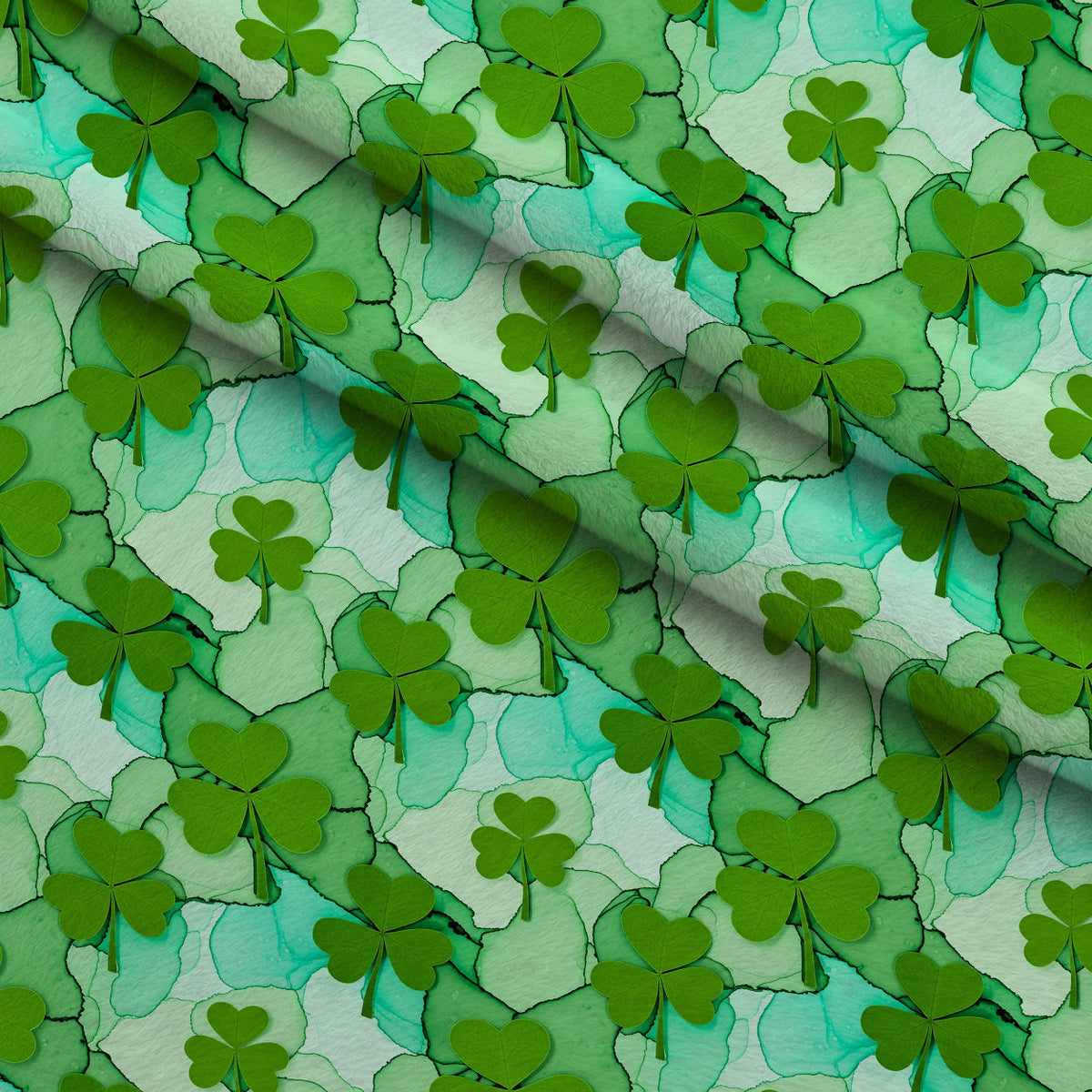 Alcohol Ink Shamrock Pattern 26 Fleece Fabric — fleece fabric folded close-up preview (mv-fleece-v1:lying)