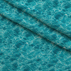 Aqua Currents Pattern 7 Fleece Fabric — fleece fabric folded close-up preview (mv-fleece-v1:lying)
