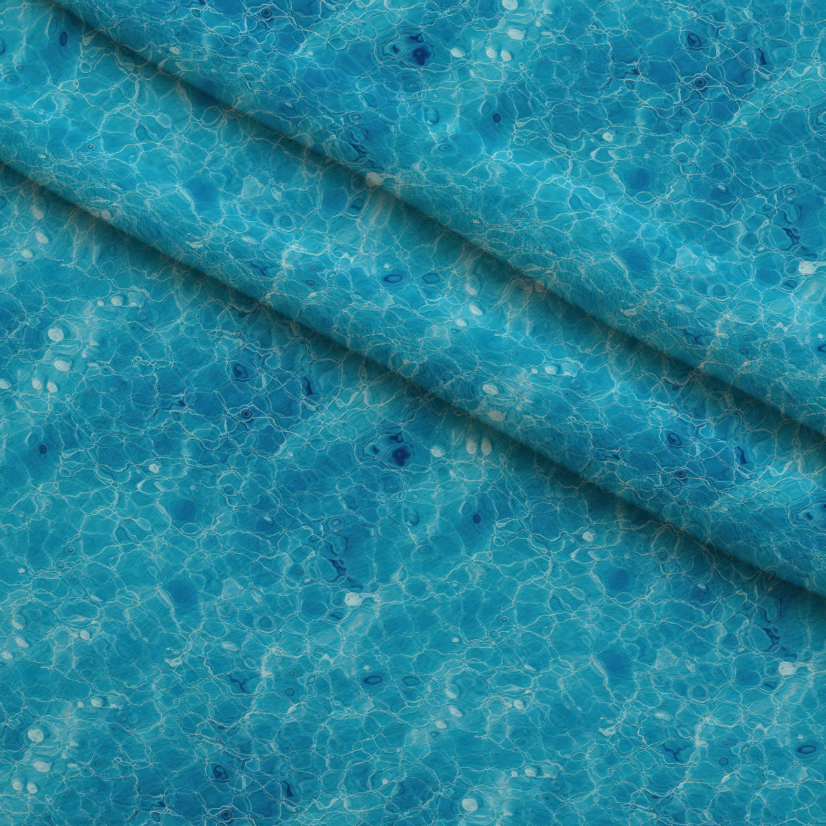 Aqua Currents Pattern 9 Fleece Fabric — fleece fabric folded close-up preview (mv-fleece-v1:lying)