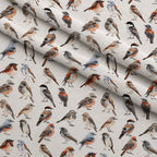 Assorted Birds Pattern Fleece Fabric — fleece fabric folded close-up preview (mv-fleece-v1:lying)