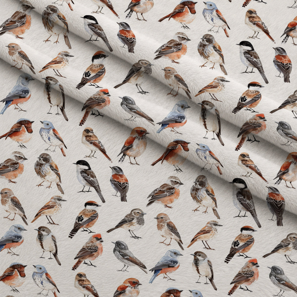 Assorted Birds Pattern Fleece Fabric — fleece fabric folded close-up preview (mv-fleece-v1:lying)
