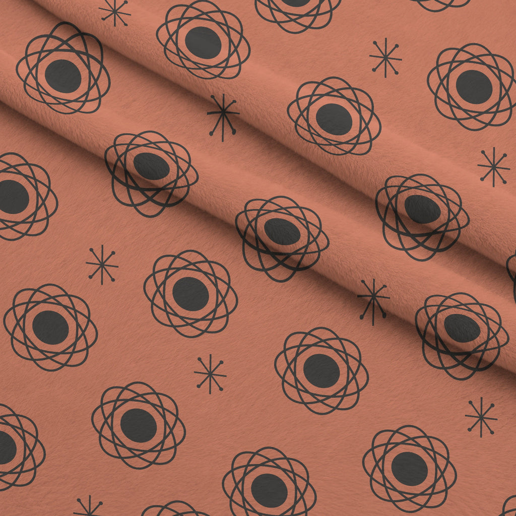 Atomic Lounge Pattern 10 Fleece Fabric — fleece fabric folded close-up preview (mv-fleece-v1:lying)