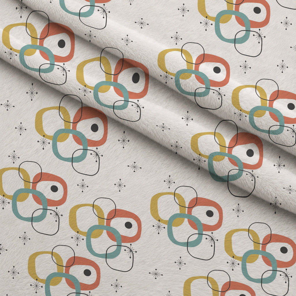Atomic Lounge Pattern 16 Fleece Fabric — fleece fabric folded close-up preview (mv-fleece-v1:lying)
