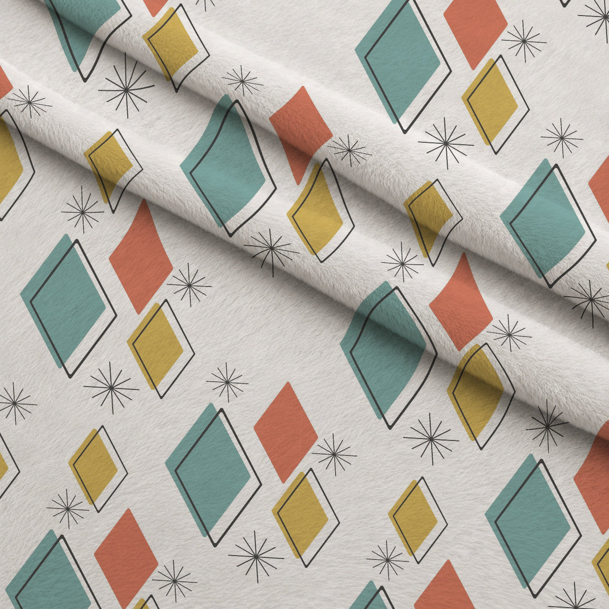 Atomic Lounge Pattern 20 Fleece Fabric — fleece fabric folded close-up preview (mv-fleece-v1:lying)
