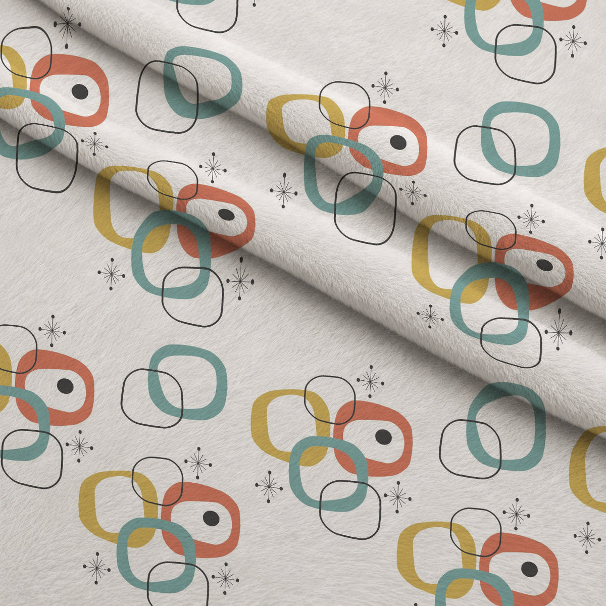 Atomic Lounge Pattern 21 Fleece Fabric — fleece fabric folded close-up preview (mv-fleece-v1:lying)