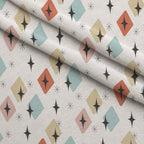 Atomic Lounge Pattern 25 Fleece Fabric — fleece fabric folded close-up preview (mv-fleece-v1:lying)