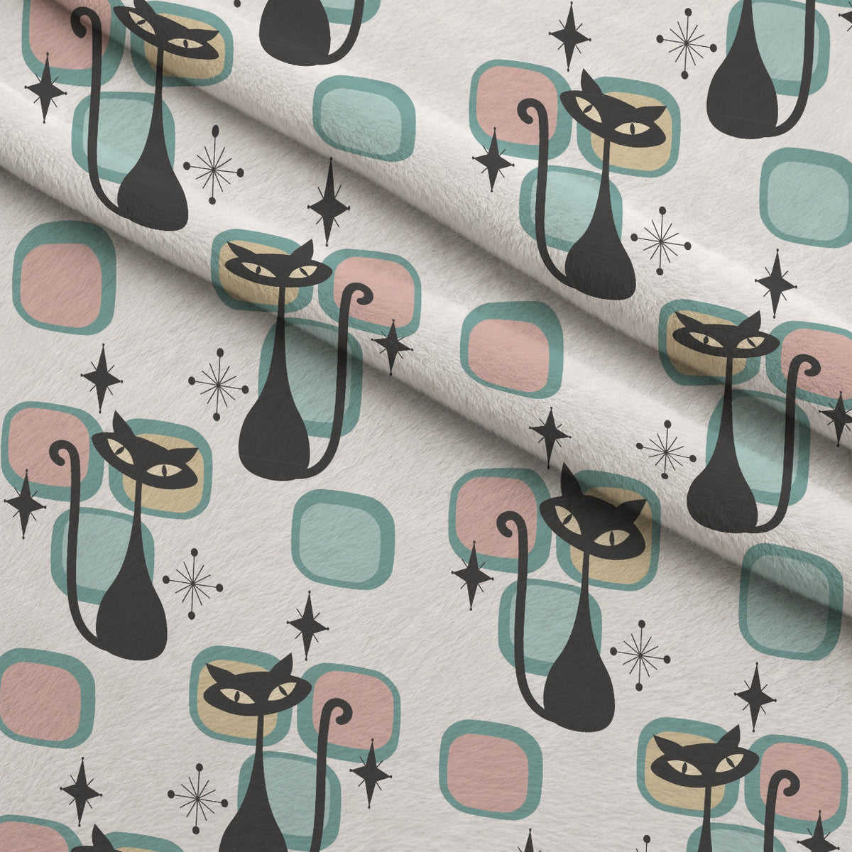 Atomic Lounge Pattern 26 Fleece Fabric — fleece fabric folded close-up preview (mv-fleece-v1:lying)