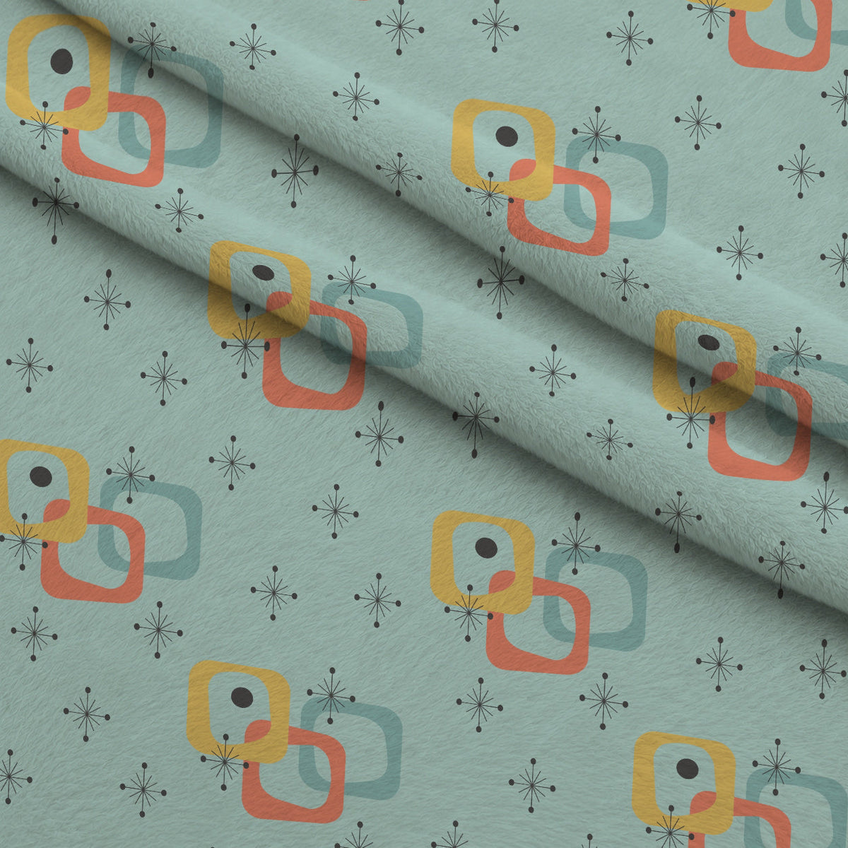 Atomic Lounge Pattern 3 Fleece Fabric — fleece fabric folded close-up preview (mv-fleece-v1:lying)