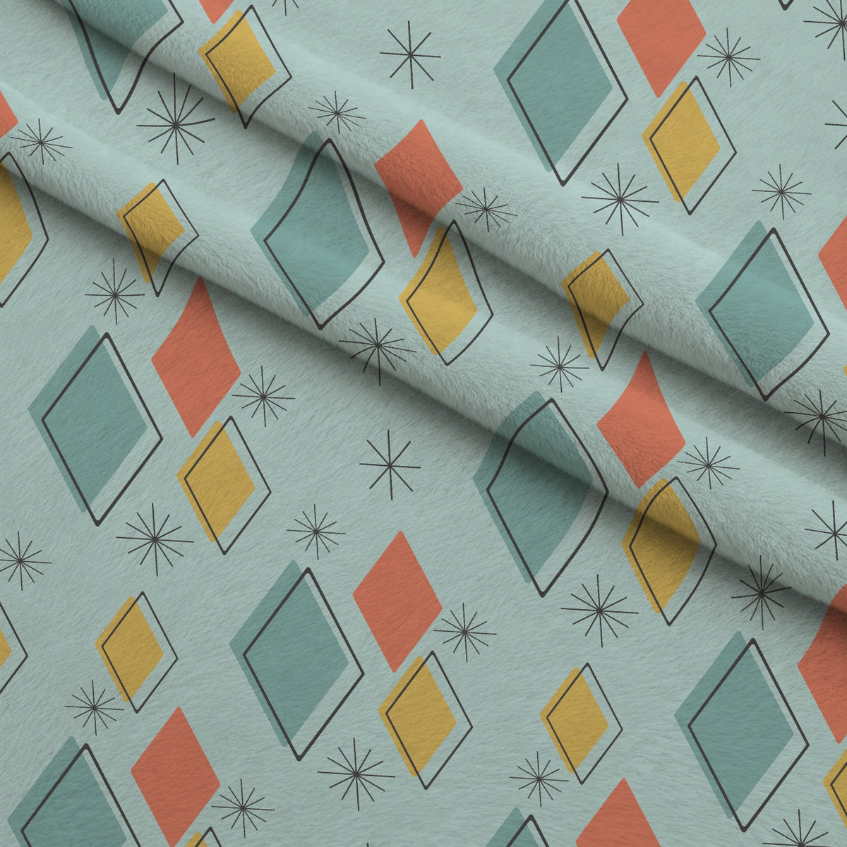 Atomic Lounge Pattern 30 Fleece Fabric — fleece fabric folded close-up preview (mv-fleece-v1:lying)