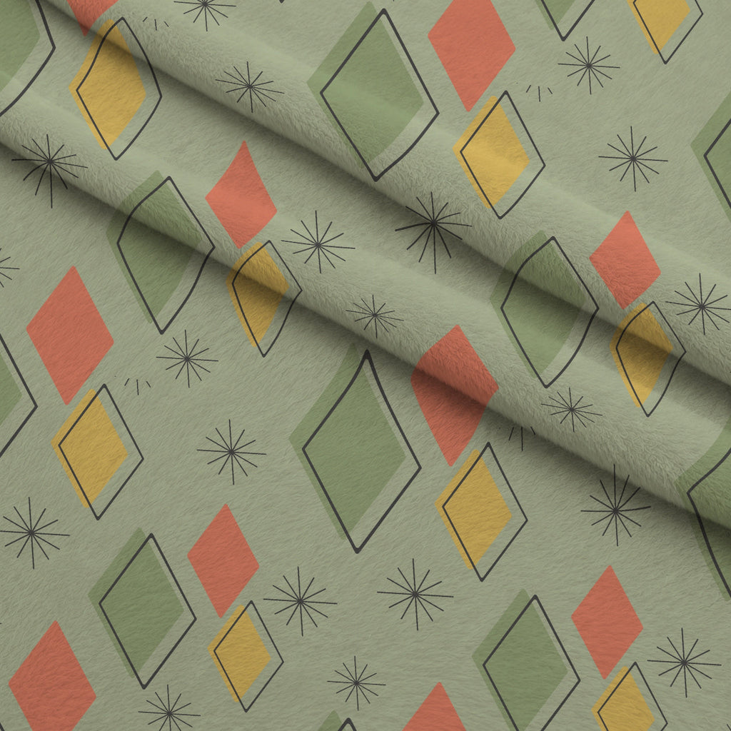 Atomic Lounge Pattern 33 Fleece Fabric — fleece fabric folded close-up preview (mv-fleece-v1:lying)