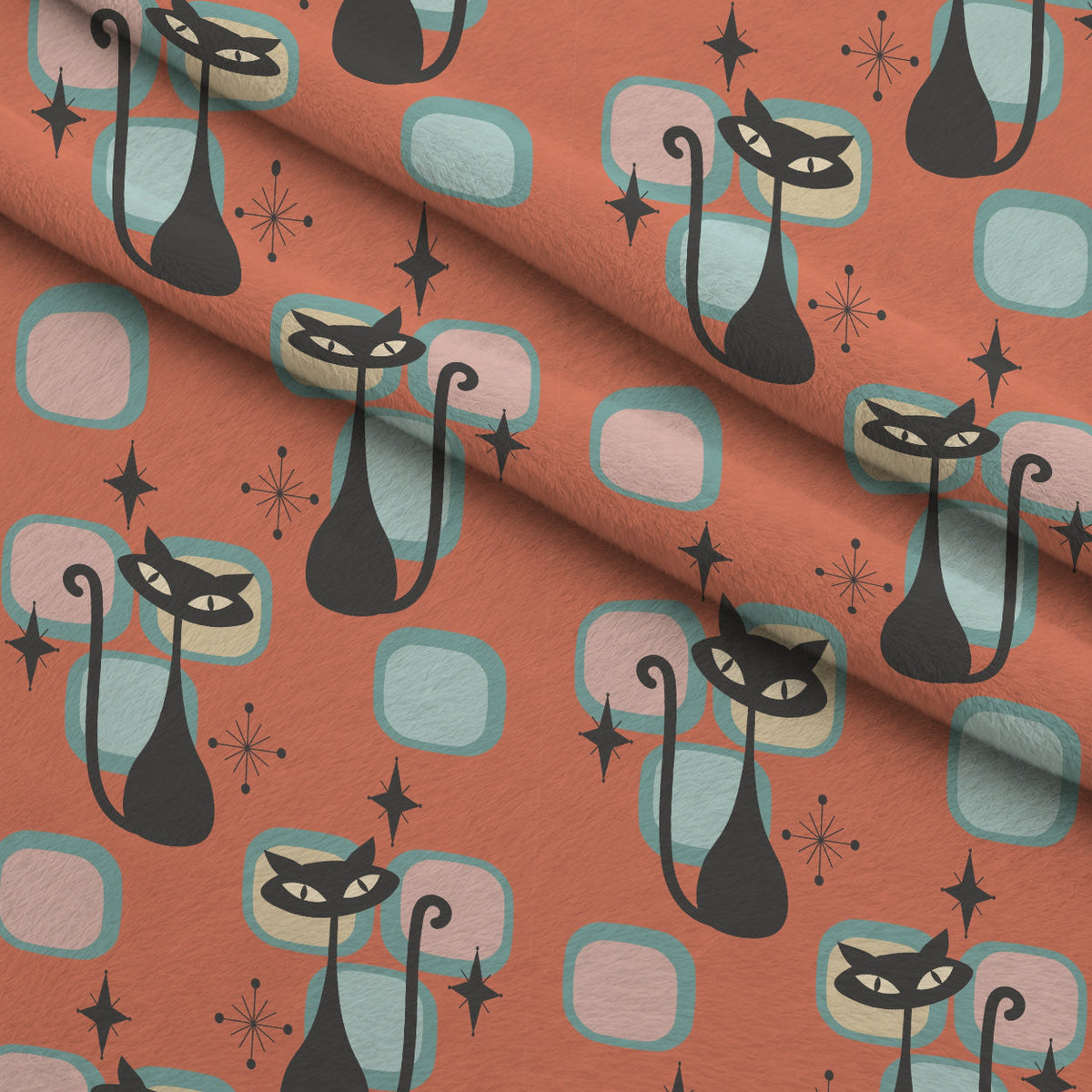 Atomic Lounge Pattern 36 Fleece Fabric — fleece fabric folded close-up preview (mv-fleece-v1:lying)