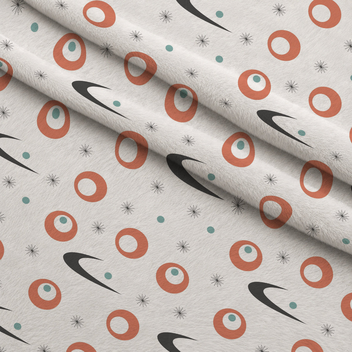 Atomic Lounge Pattern 39 Fleece Fabric — fleece fabric folded close-up preview (mv-fleece-v1:lying)