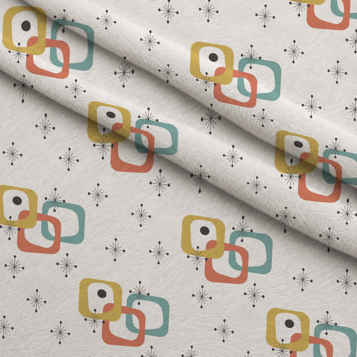 Atomic Lounge Pattern 40 Fleece Fabric — fleece fabric folded close-up preview (mv-fleece-v1:lying)