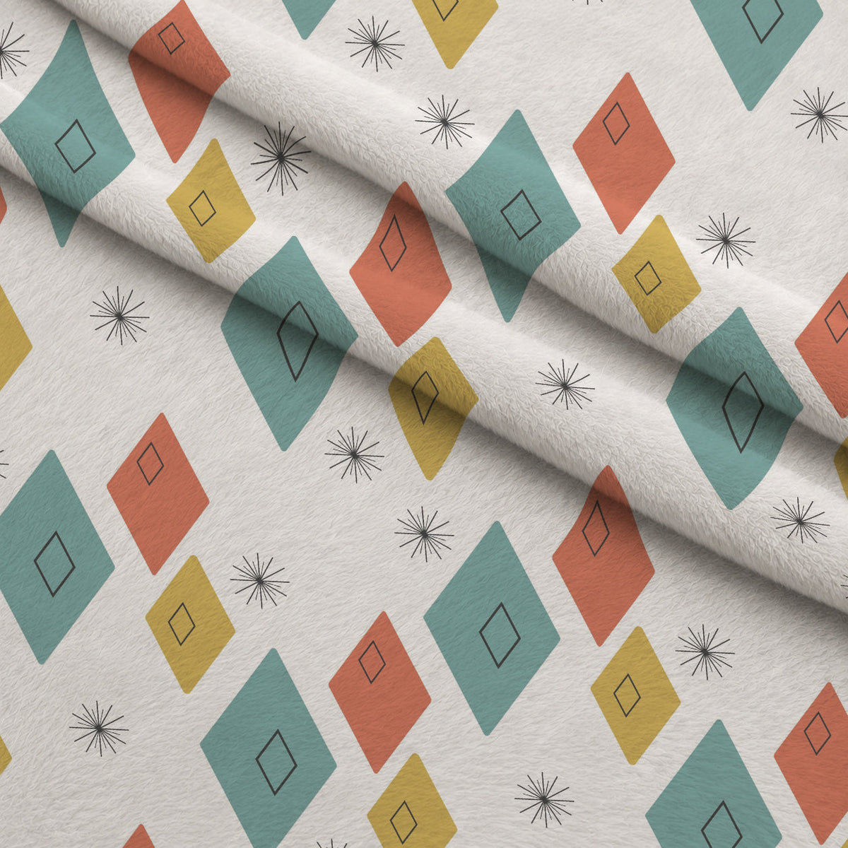 Atomic Lounge Pattern 43 Fleece Fabric — fleece fabric folded close-up preview (mv-fleece-v1:lying)