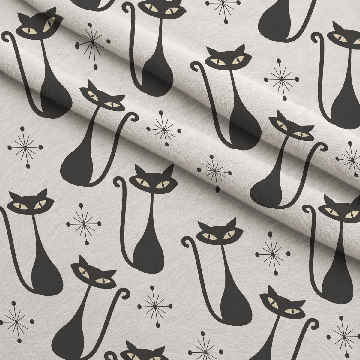 Atomic Lounge Pattern 45 Fleece Fabric — fleece fabric folded close-up preview (mv-fleece-v1:lying)