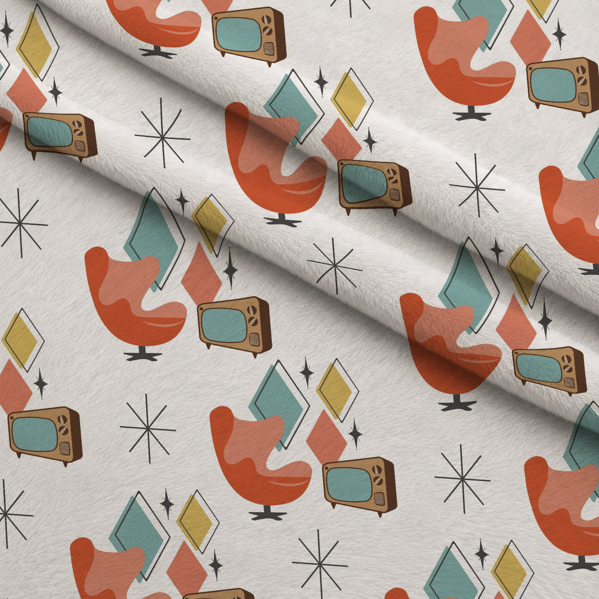 Atomic Lounge Pattern 46 Fleece Fabric — fleece fabric folded close-up preview (mv-fleece-v1:lying)