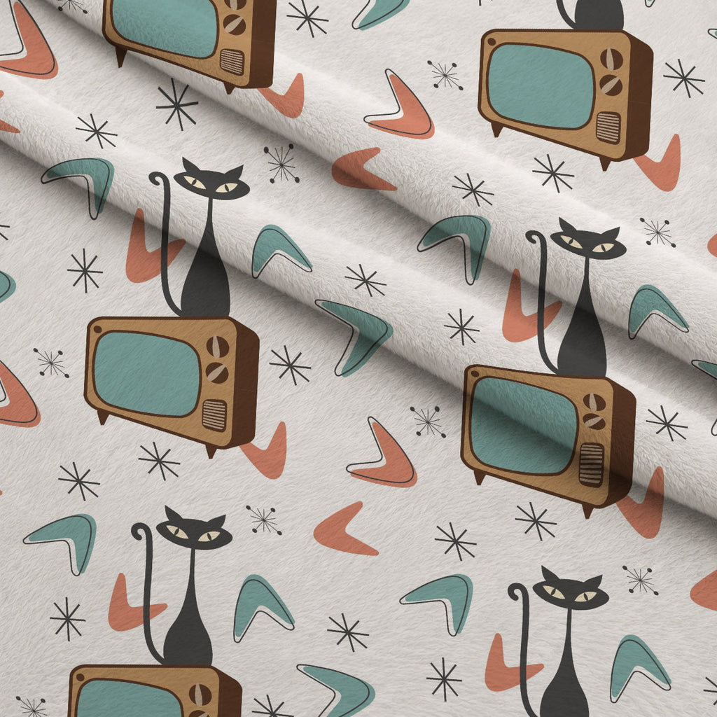 Atomic Lounge Pattern 47 Fleece Fabric — fleece fabric folded close-up preview (mv-fleece-v1:lying)