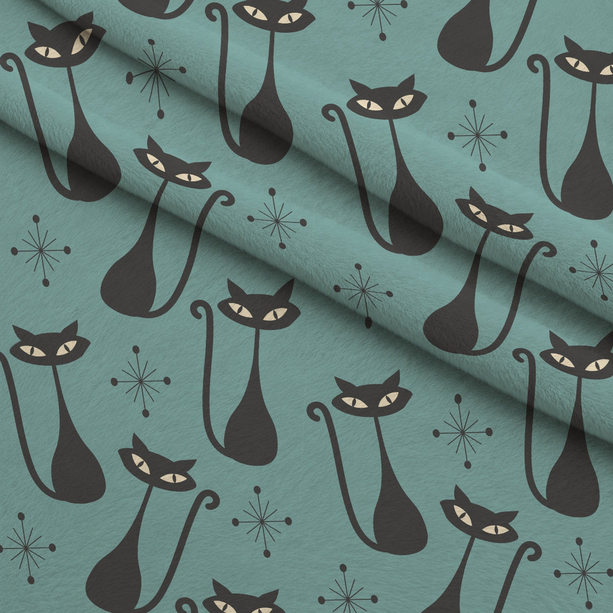 Atomic Lounge Pattern 9 Fleece Fabric — fleece fabric folded close-up preview (mv-fleece-v1:lying)