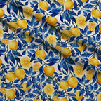 Azulejo Lemons with Blue Leaves Pattern 3 Fleece Fabric — fleece fabric folded close-up preview (mv-fleece-v1:lying)