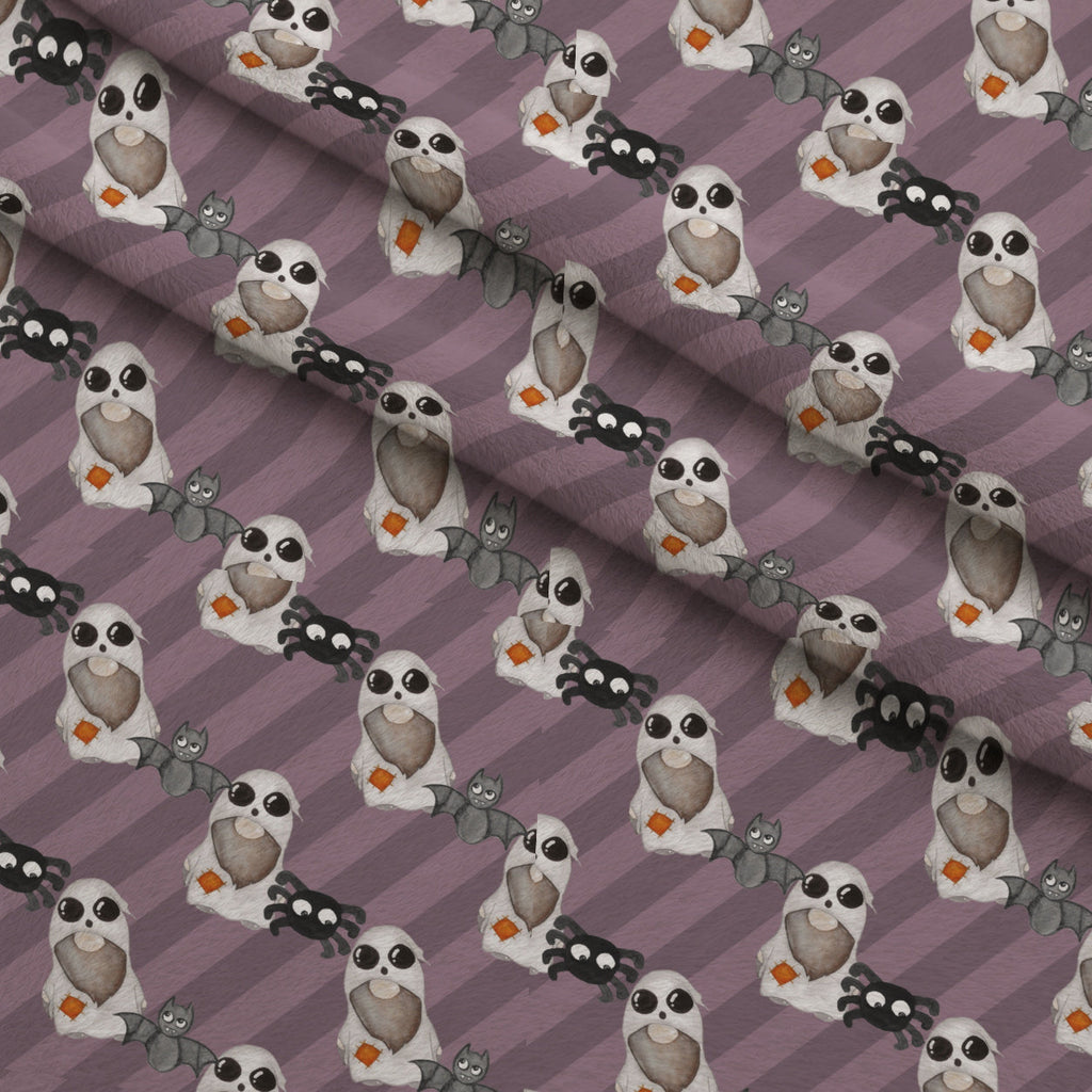 Bewitched Buddies Pattern 10 Fleece Fabric — fleece fabric folded close-up preview (mv-fleece-v1:lying)