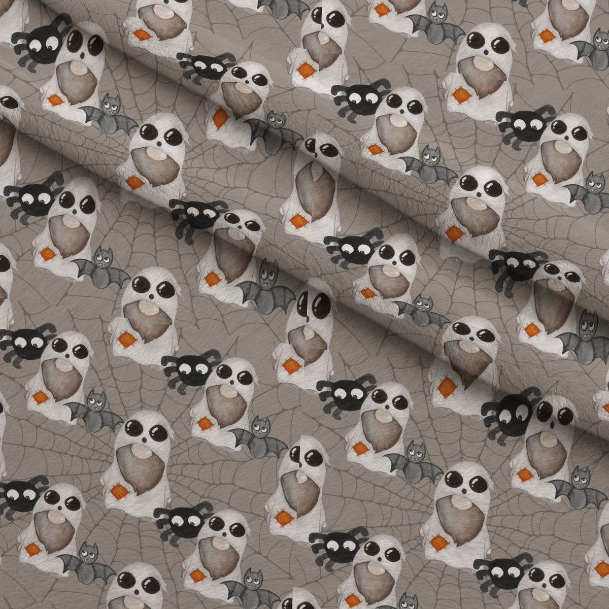 Bewitched Buddies Pattern 7 Fleece Fabric — fleece fabric folded close-up preview (mv-fleece-v1:lying)