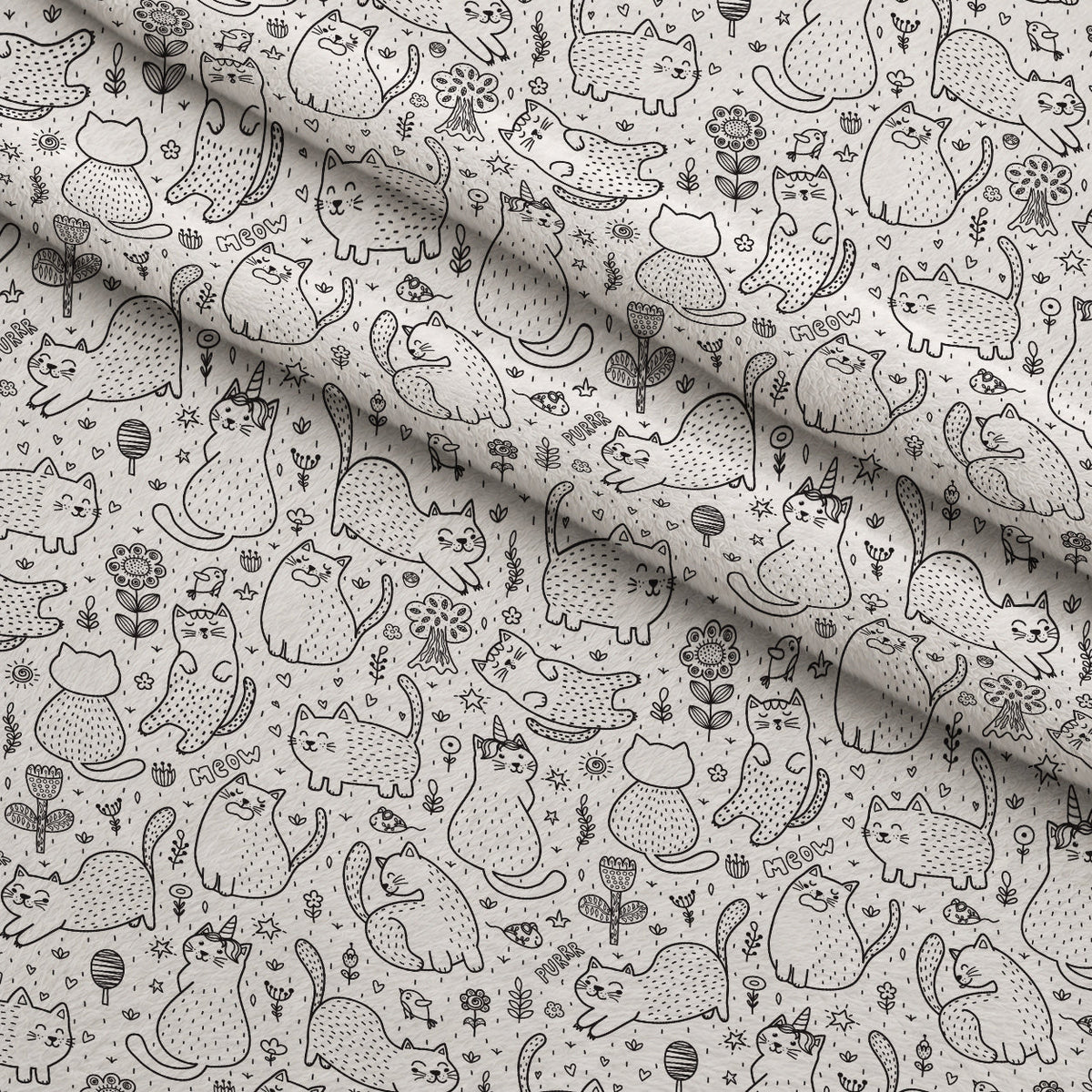 Black and White Cat Doodles Fleece Fabric — fleece fabric folded close-up preview (mv-fleece-v1:lying)