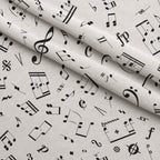 Black and White Music Notes Fleece Fabric — fleece fabric folded close-up preview (mv-fleece-v1:lying)