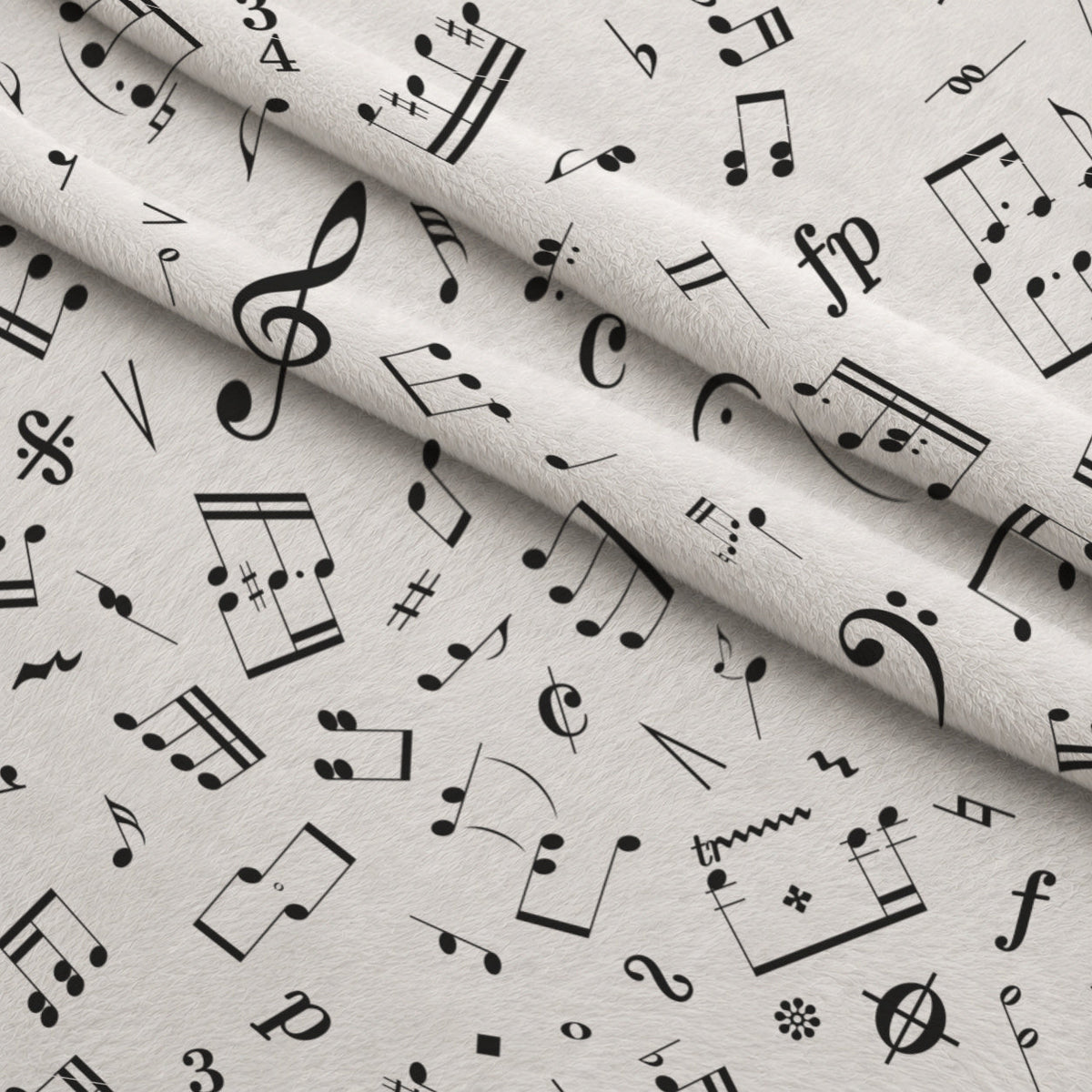 Black and White Music Notes Fleece Fabric — fleece fabric folded close-up preview (mv-fleece-v1:lying)