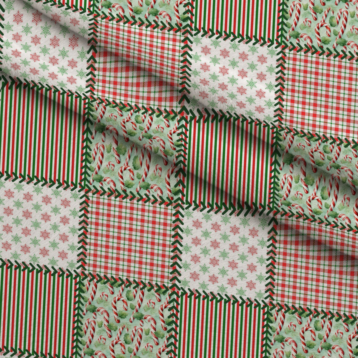 Christmas Patches Pattern 1 Fleece Fabric — fleece fabric folded close-up preview (mv-fleece-v1:lying)
