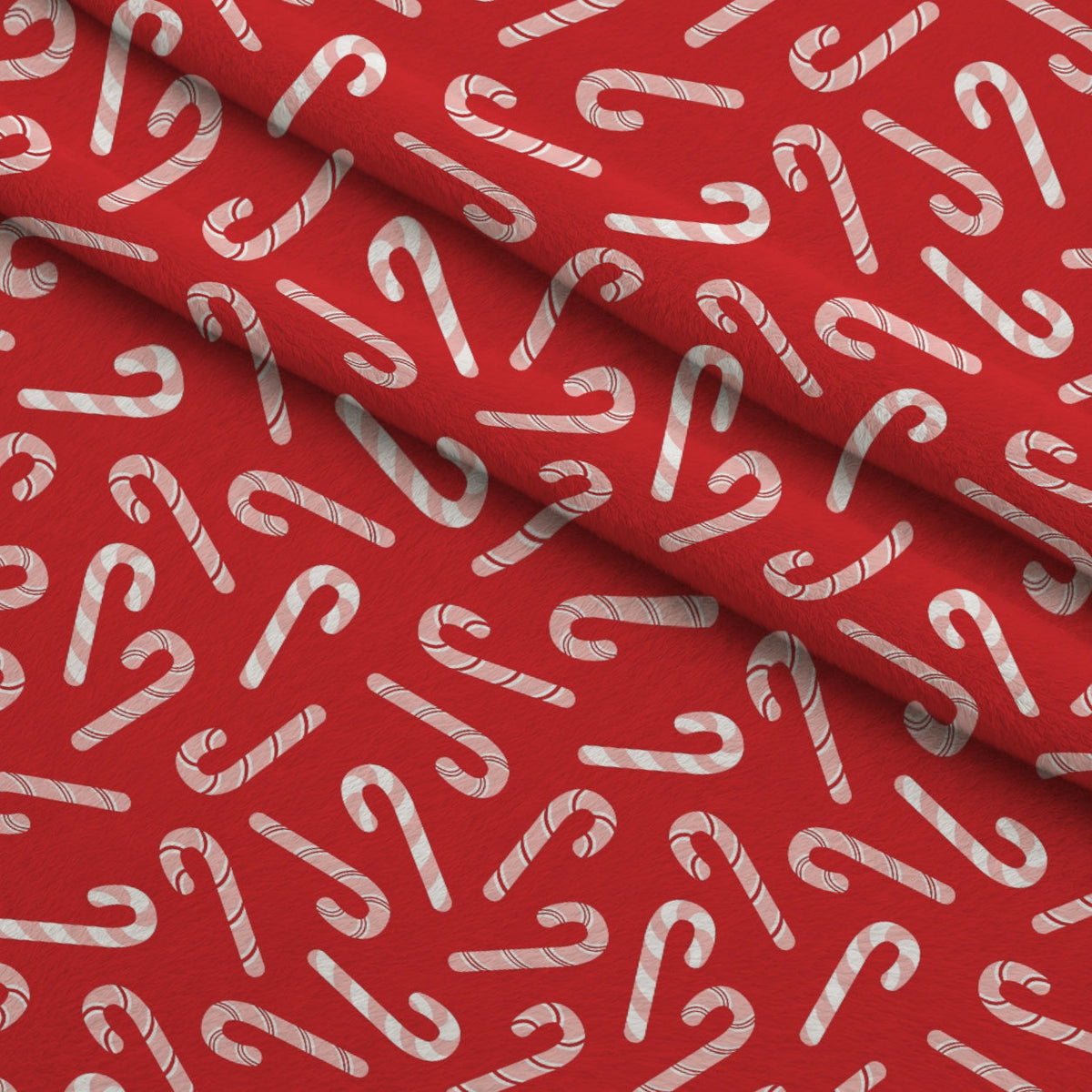 Christmas Treats Candy Pattern 2 Fleece Fabric — fleece fabric folded close-up preview (mv-fleece-v1:lying)