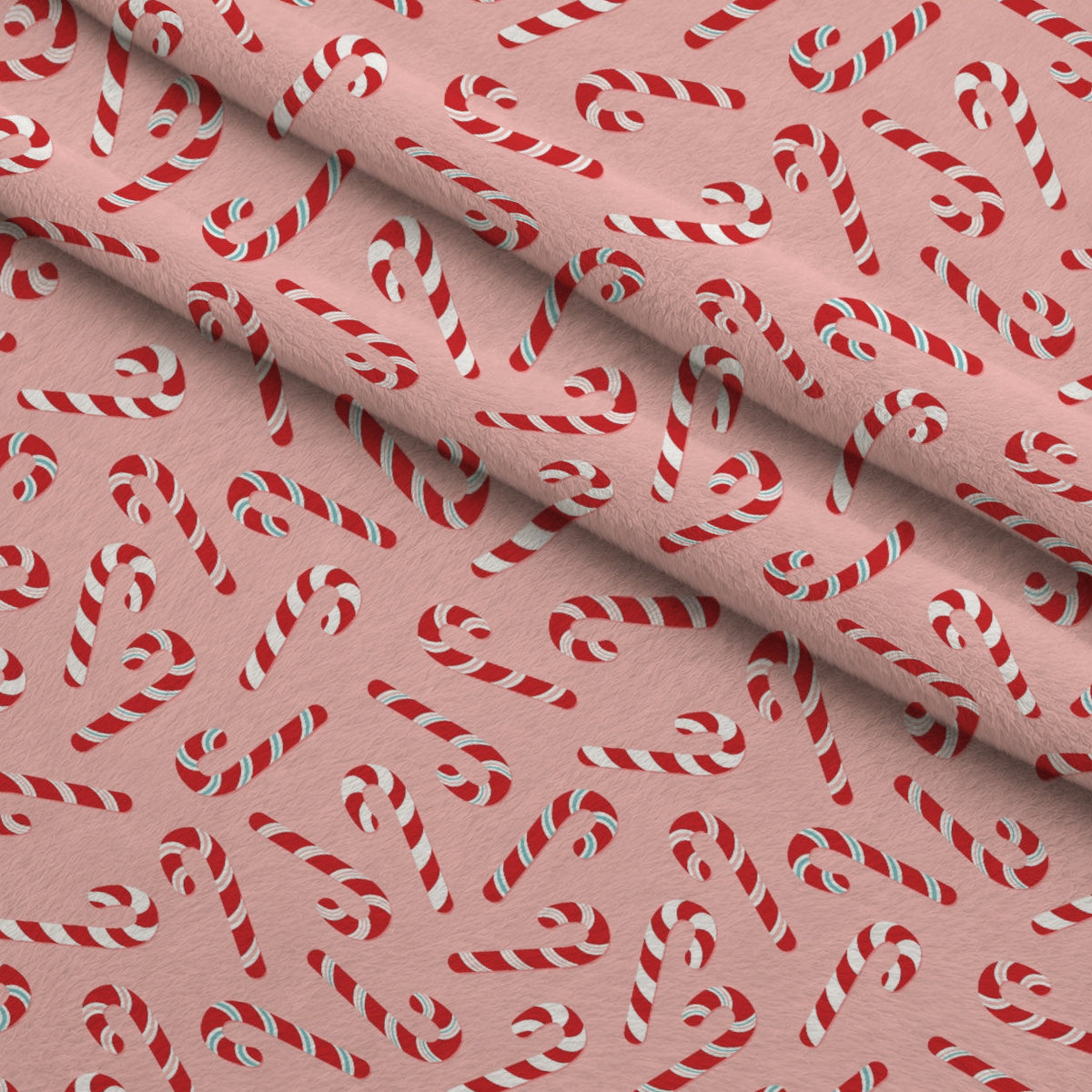 Christmas Treats Candy Pattern 3 Fleece Fabric — fleece fabric folded close-up preview (mv-fleece-v1:lying)