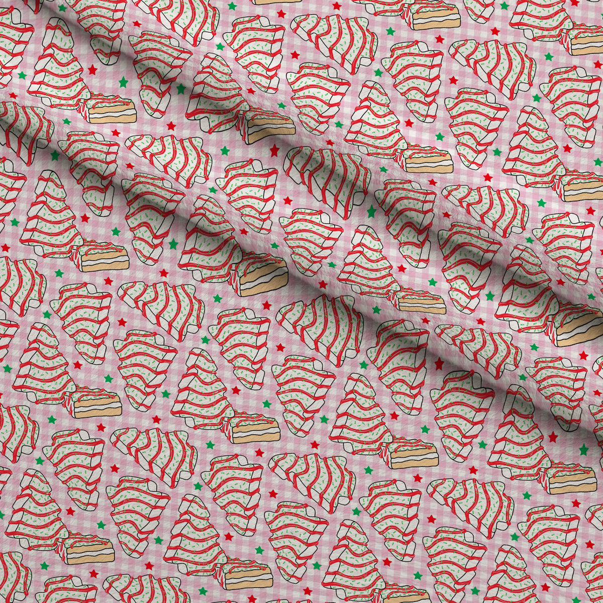 Christmas Tree Cakes Pattern 2 Fleece Fabric — fleece fabric folded close-up preview (mv-fleece-v1:lying)