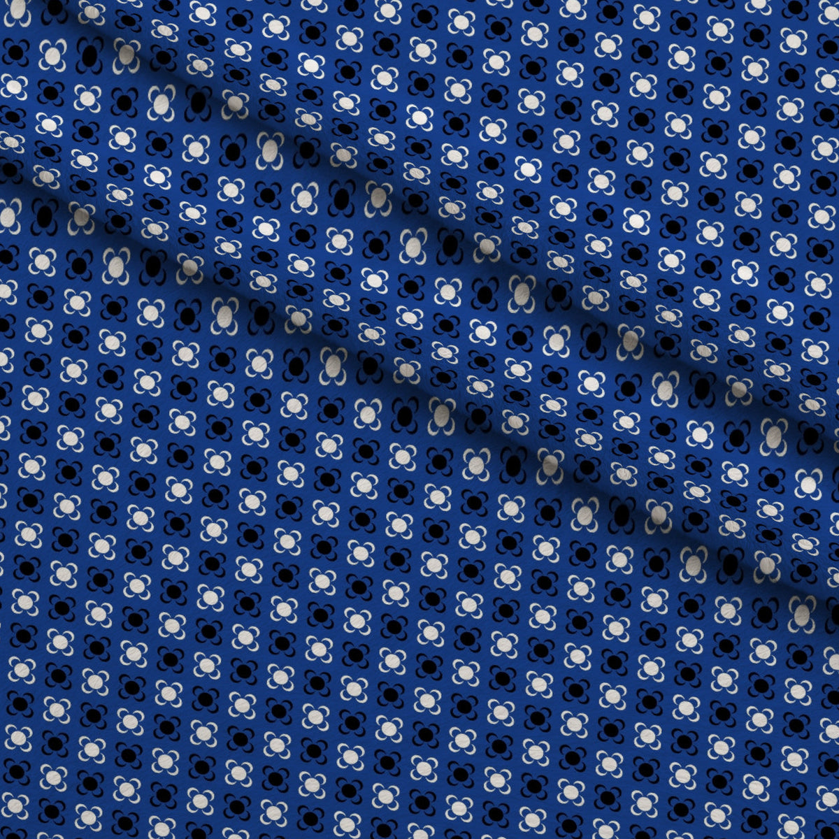 Cobalt Paisley Pattern 1 Fleece Fabric — fleece fabric folded close-up preview (mv-fleece-v1:lying)
