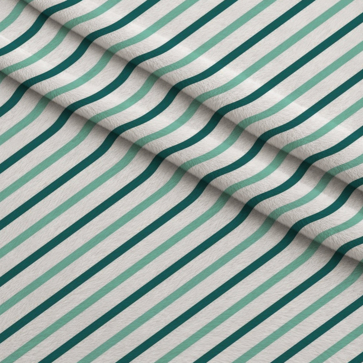 Diagonal Stripes Mint and Teal Fleece Fabric — fleece fabric folded close-up preview (mv-fleece-v1:lying)