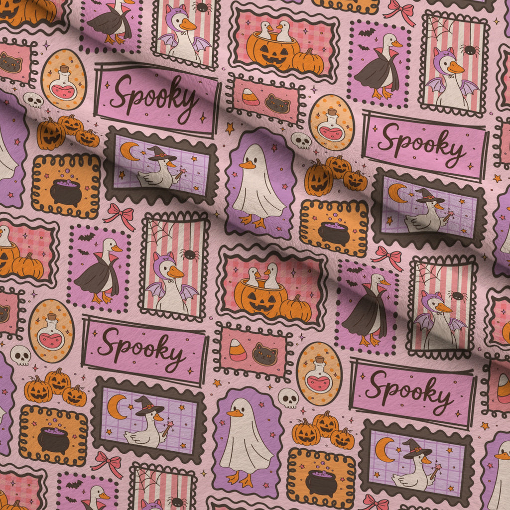 Giggly Ghost Parade Pattern 1 Fleece Fabric — fleece fabric folded close-up preview (mv-fleece-v1:lying)