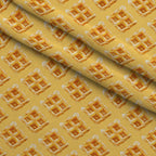 Golden Griddle Pattern 7 Fleece Fabric — fleece fabric folded close-up preview (mv-fleece-v1:lying)