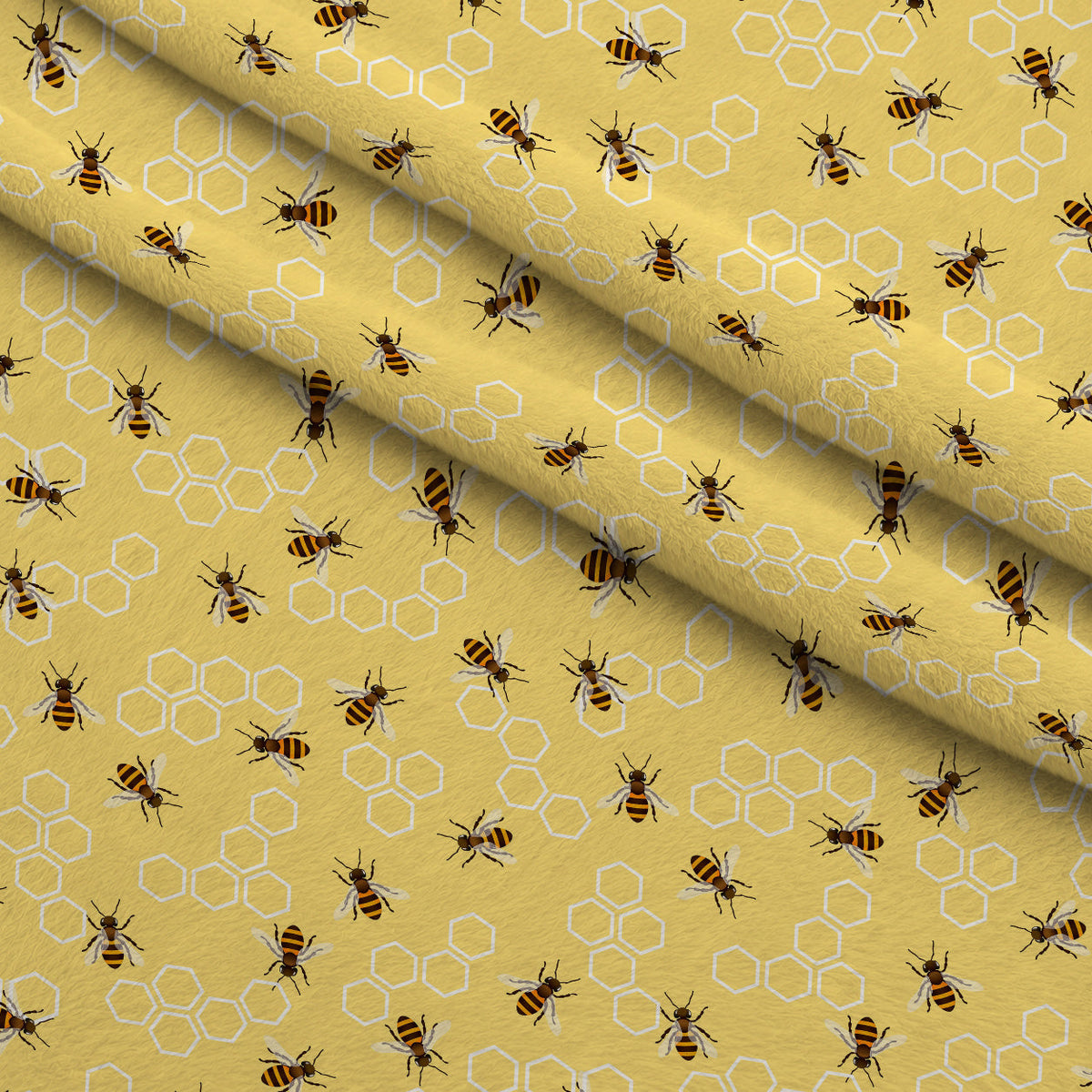 Golden Hive Pattern 1 Fleece Fabric — fleece fabric folded close-up preview (mv-fleece-v1:lying)