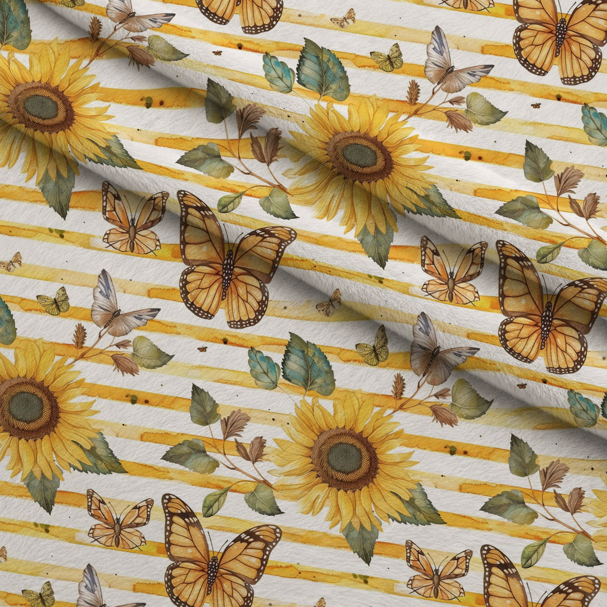 Golden Meadow Flutter Pattern 12 Fleece Fabric — fleece fabric folded close-up preview (mv-fleece-v1:lying)