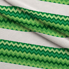Green Chevron Pattern Fleece Fabric — fleece fabric folded close-up preview (mv-fleece-v1:lying)