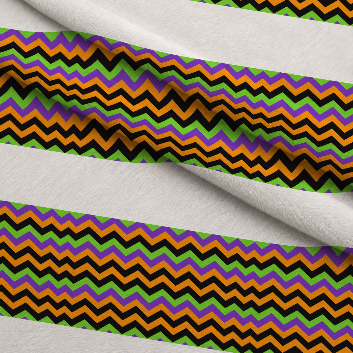 Halloween Chevron Pattern Fleece Fabric — fleece fabric folded close-up preview (mv-fleece-v1:lying)