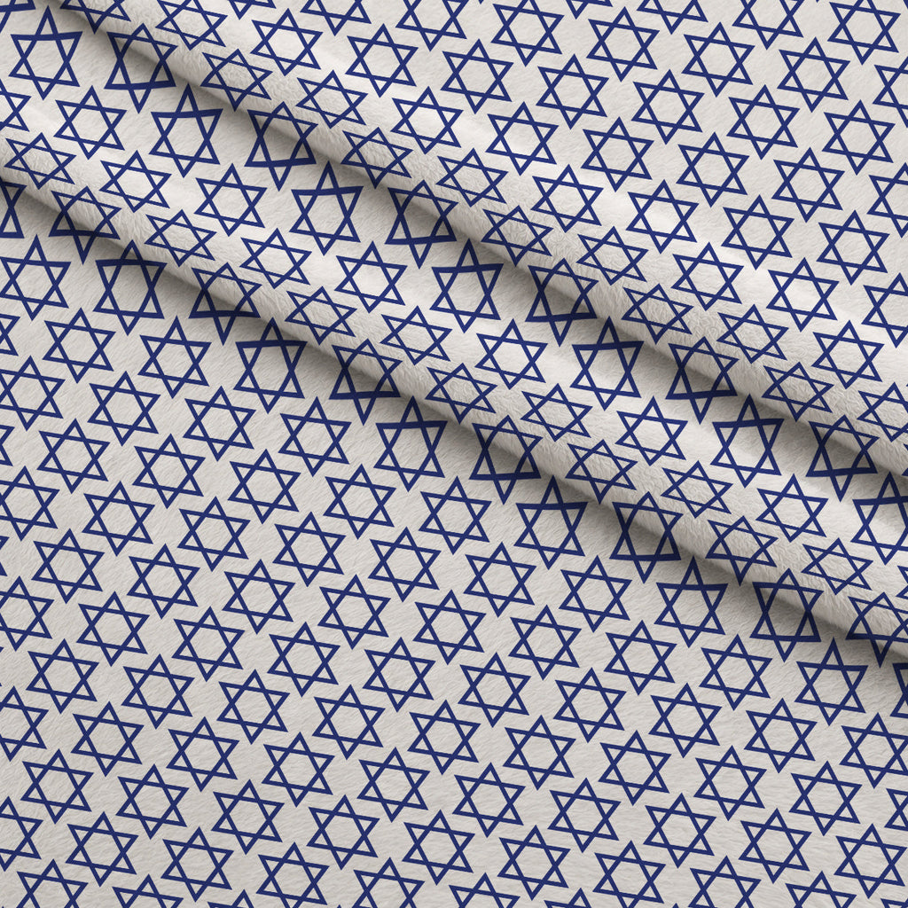 Hanukkah Gifts Pattern 12 White Fleece Fabric — fleece fabric folded close-up preview (mv-fleece-v1:lying)