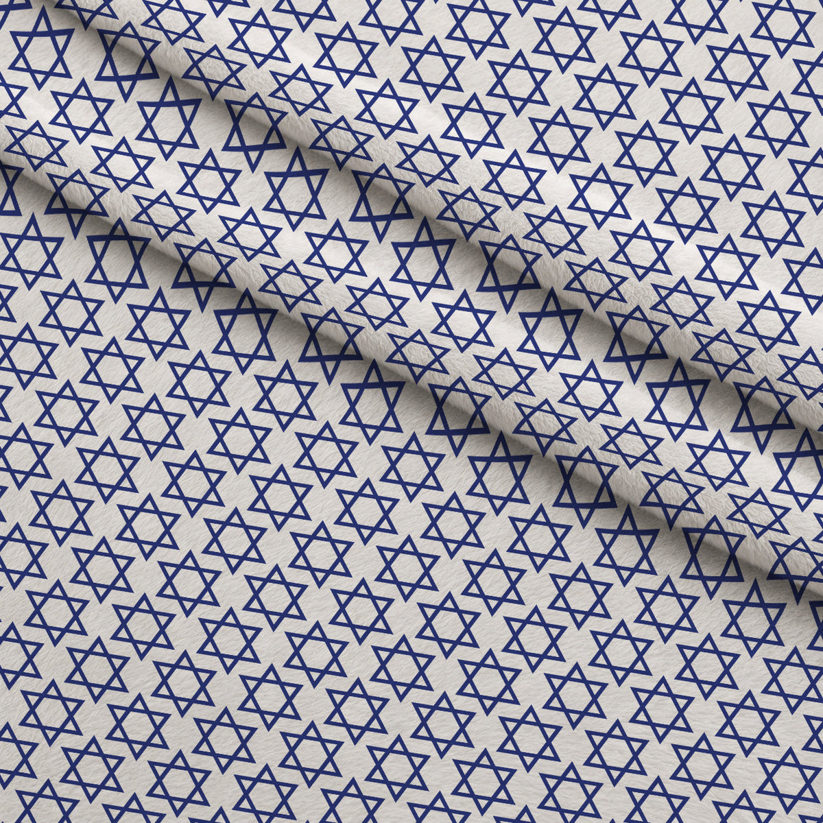 Hanukkah Gifts Pattern 12 White Fleece Fabric — fleece fabric folded close-up preview (mv-fleece-v1:lying)