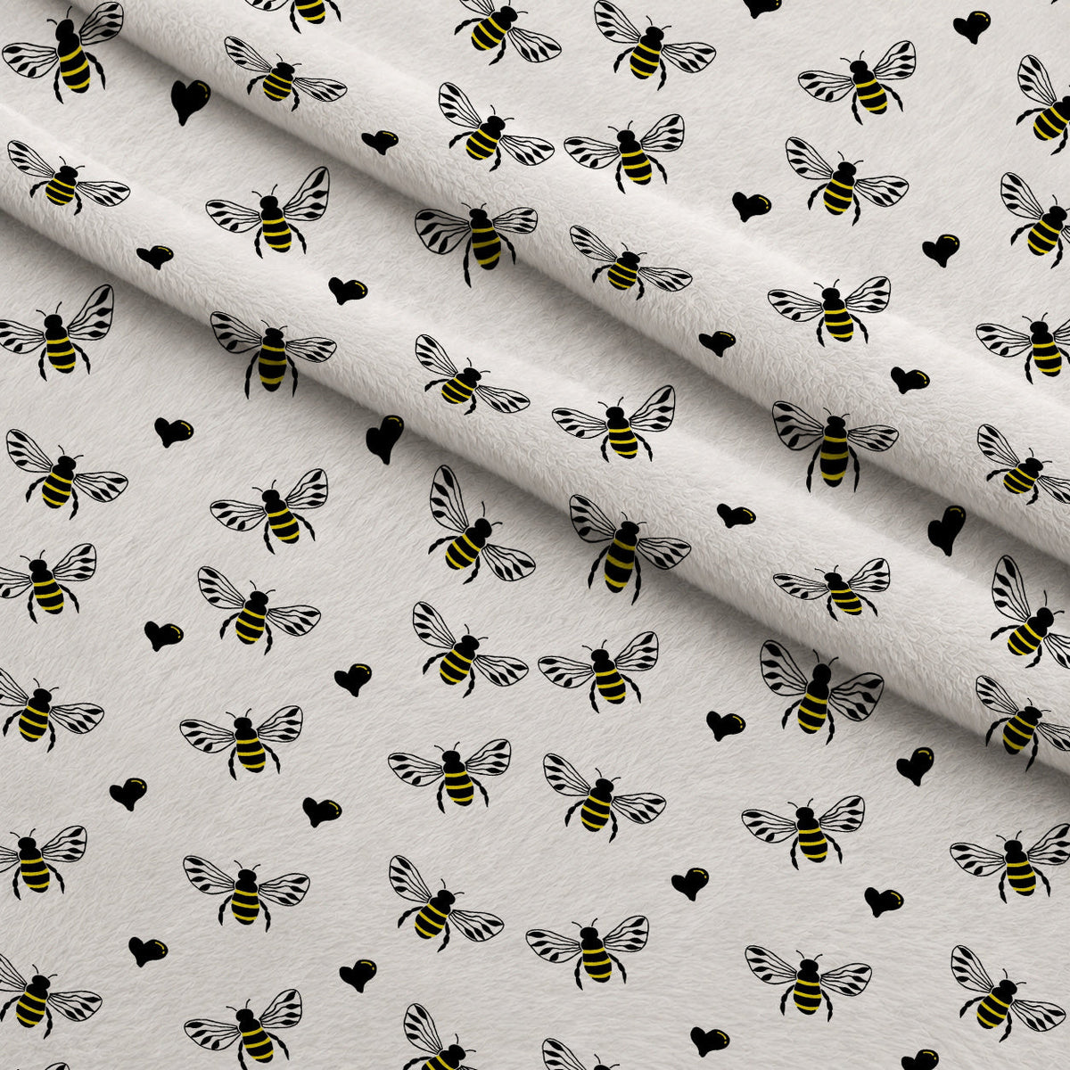 Honeybee Hearts Pattern 1 Fleece Fabric — fleece fabric folded close-up preview (mv-fleece-v1:lying)